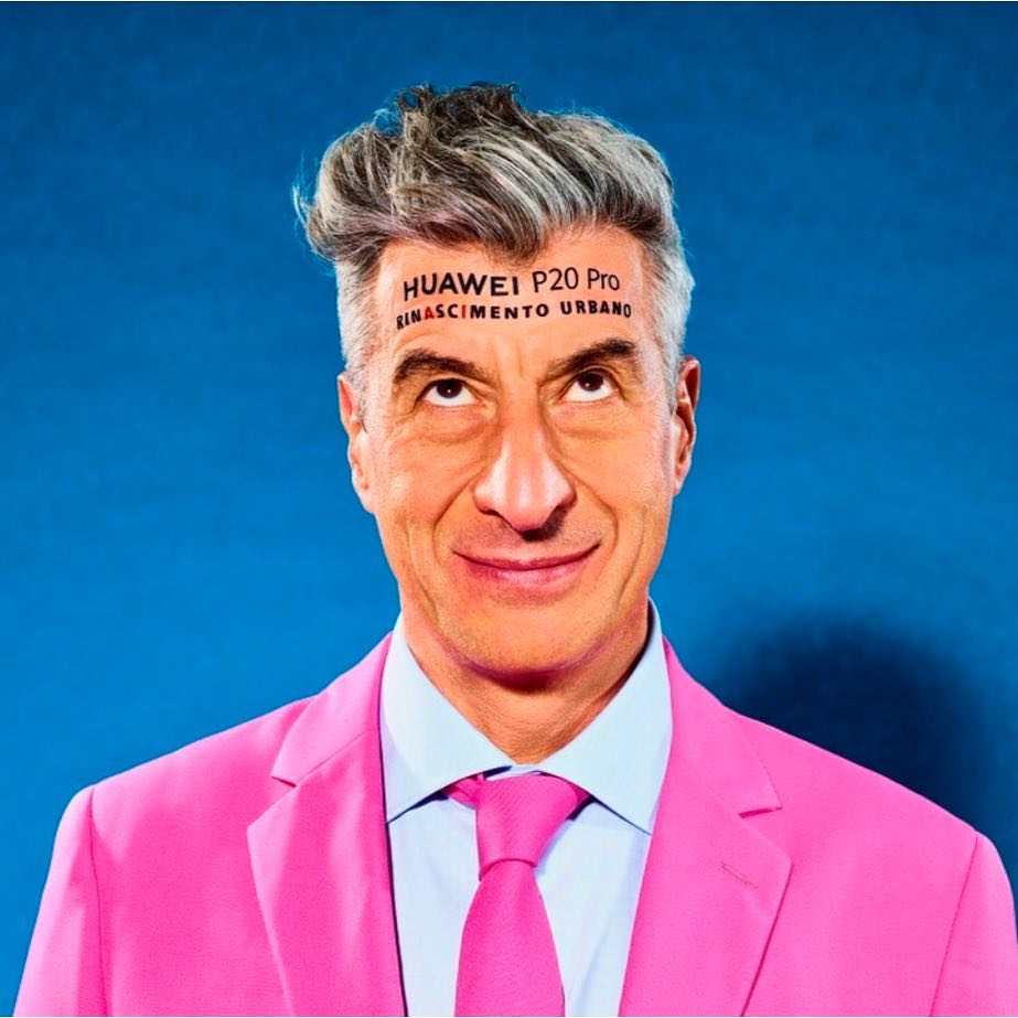 Maurizio Cattelan with his Huawei P20 Pro advert. Image courtesy of the artist's Instagram