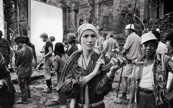 Mary Ellen Mark with a snake during the filming of Apocalypse Now, Pagsanjan, The Philippines, 1976 (photograph by Dean Tavoularis)