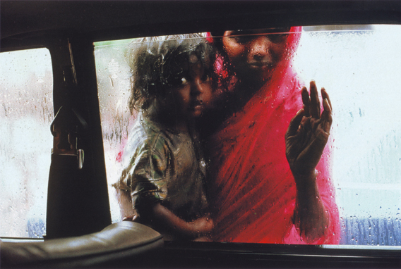 Mother and Child at Car Window, Bombay, India, 1993, by Steve McCurry