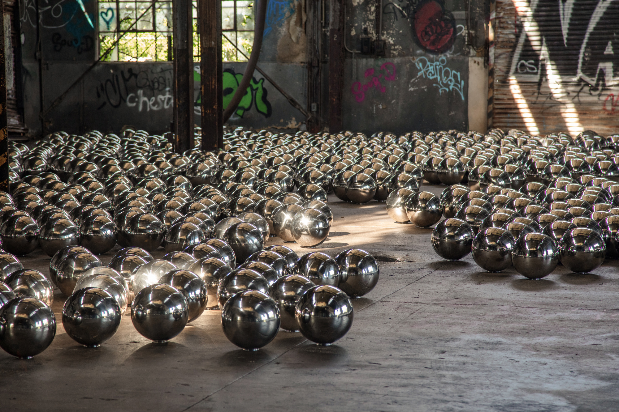 Rockaway! 2018 featuring a site-specific installation of Narcissus Garden by Yayoi Kusama. Artwork ©YAYOI KUSAMA. Artwork courtesy Ota Fine Arts, Tokyo/Singapore/Shanghai; Victoria Miro, London/Venice; and David Zwirner, New York. Photo: Pablo Enriquez