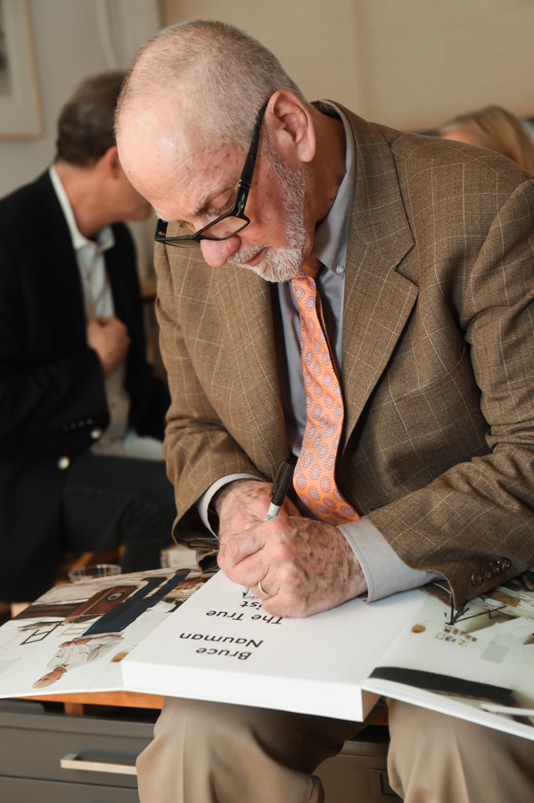 Peter Plagens signing copies of Bruce Nauman: The True Artist