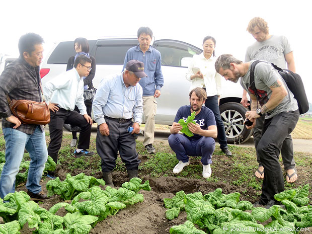 Noma's Thomas Frebet (top right), Lars Williams (centre right) and René (crouching) visit farms in Itoshima, Japan