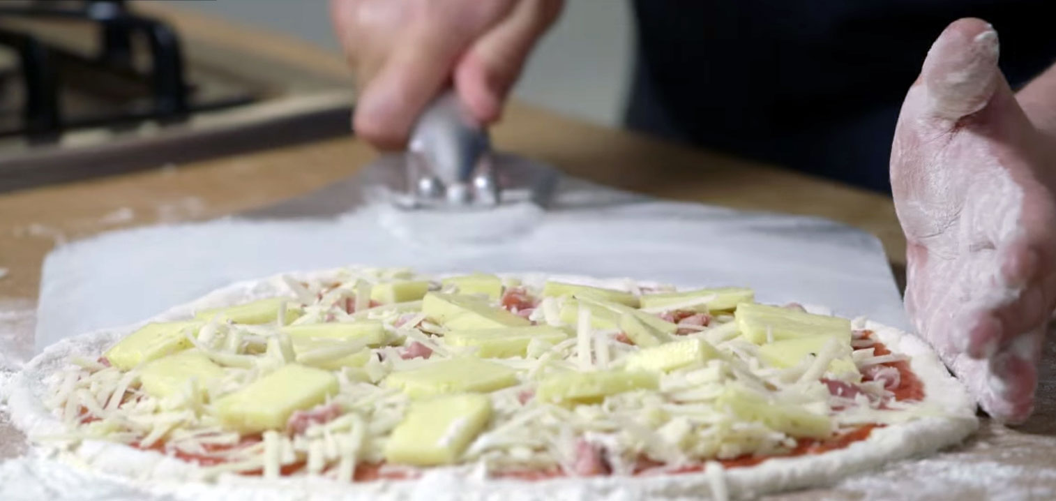 Why did Magnus Nilsson put pizza in The Nordic Baking Book?