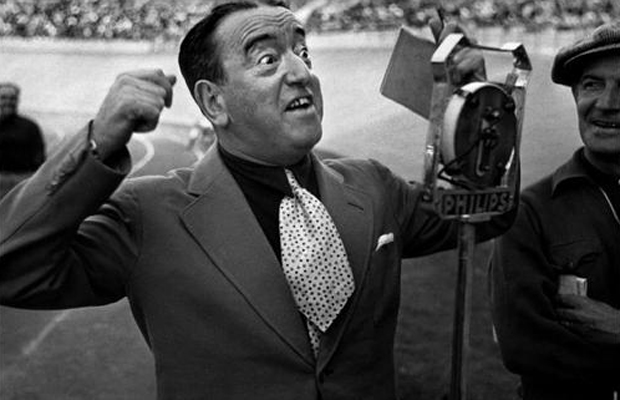 Robert Capa, 'A radio announcer at the arrival of the teams' (July, 1939) © International Center of Photography/Magnum Photos