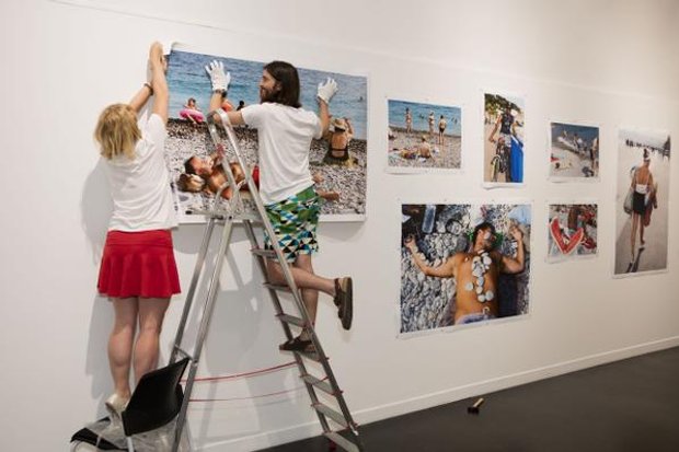 Staff installing Martin Parr's recent pop-up exhibition in Nice