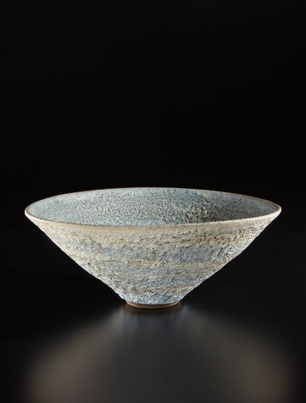 Lucie Rie Large conical bowl, circa 1980 Stoneware and mixed clays producing an integral spiral of colour and texture, estimate $20,000 - 30,000