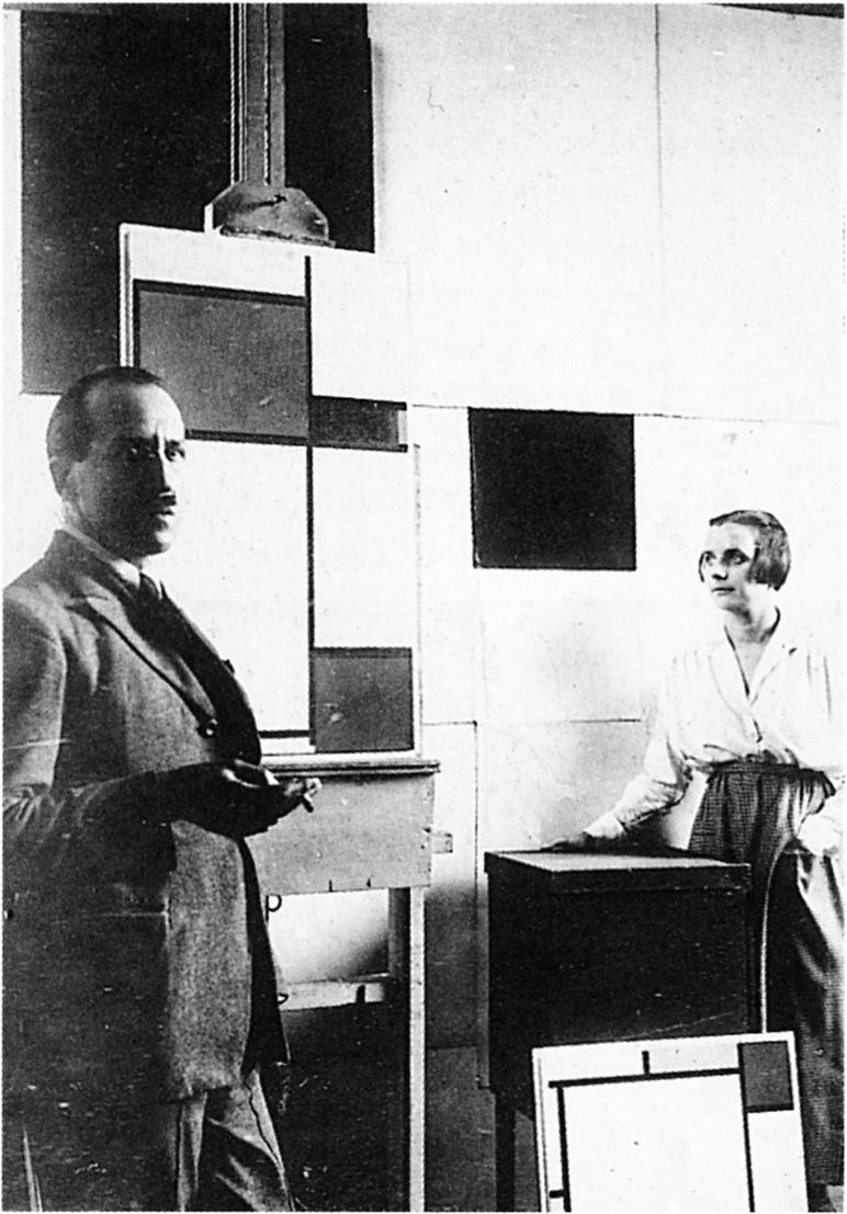 Piet Mondrian and Pétro (Nelly) van Doesburg in Mandrian's studio, Paris. 1923