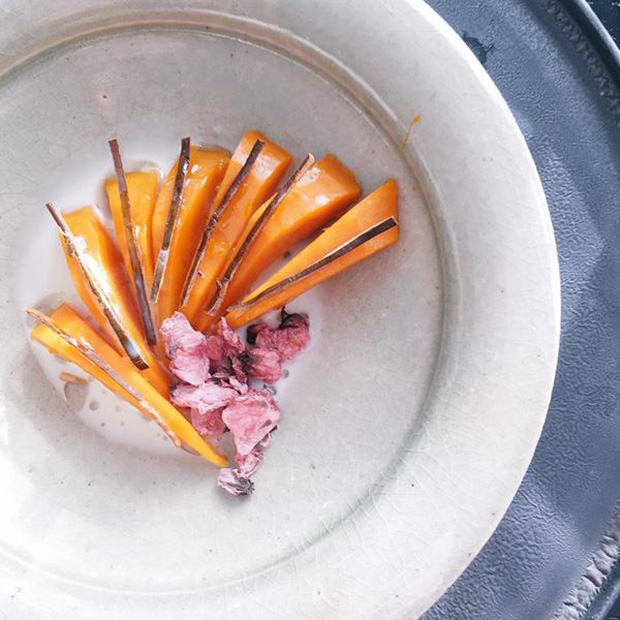 Pumpkin simmered with kelp and salted cherry blossoms. Image courtesy of Noma's Instagram account, instagram.com/reneredzepinoma