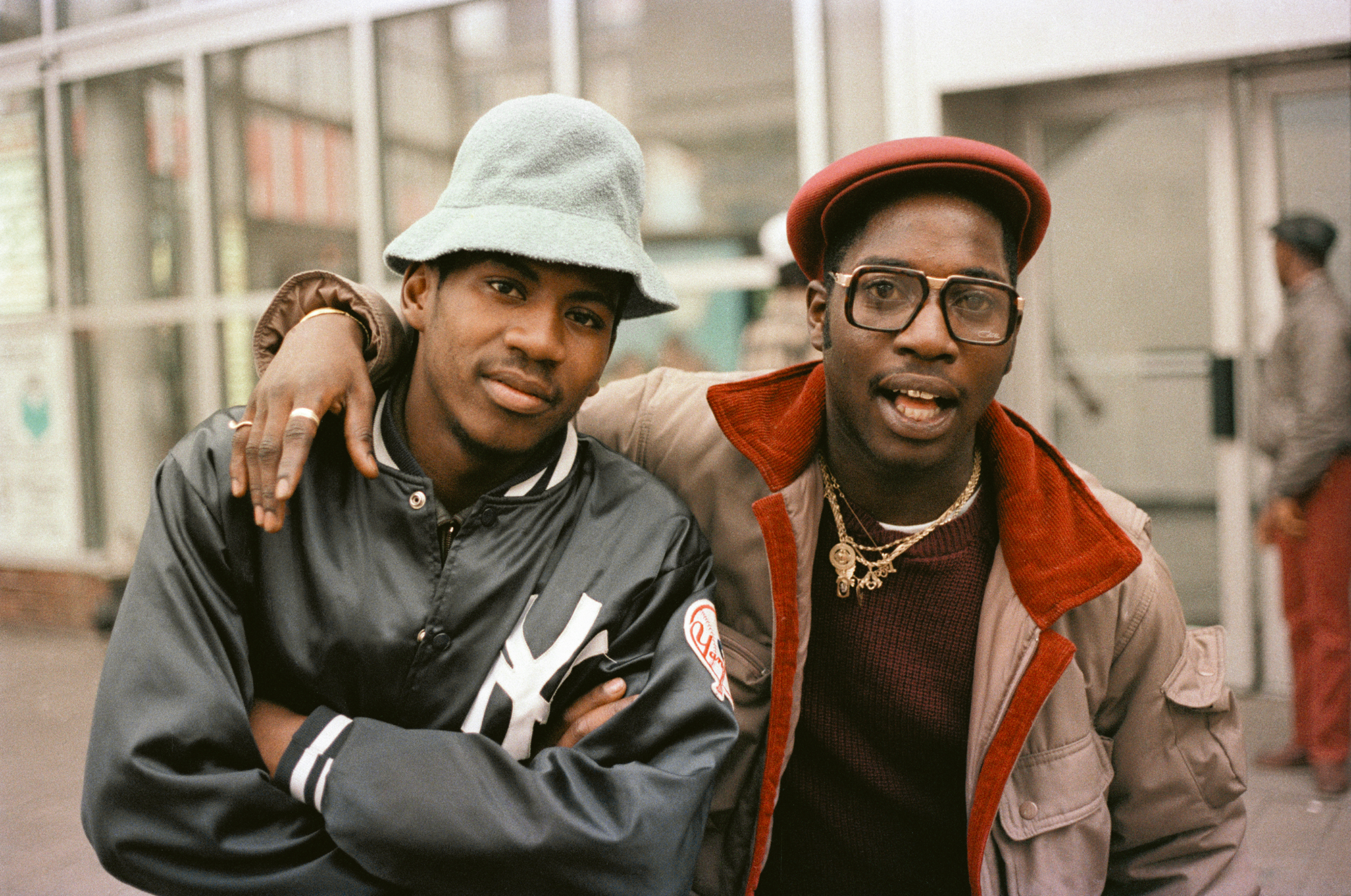 Rolling Partners, Downtown Brooklyn, NYC, 1982. Photograph by Jamel Shabazz. This image illustrates the Cazal entry in The Men's Fashion Book