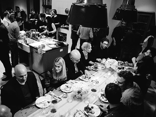 Guests enjoy Magnus's food at Adam Sachs’ Brooklyn house. Photography by Michelle Heimerman