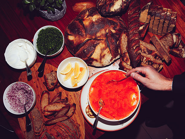 Guests serve themselves bleak roe at Adam Sachs’ Brooklyn house. Photography by Michelle Heimerman