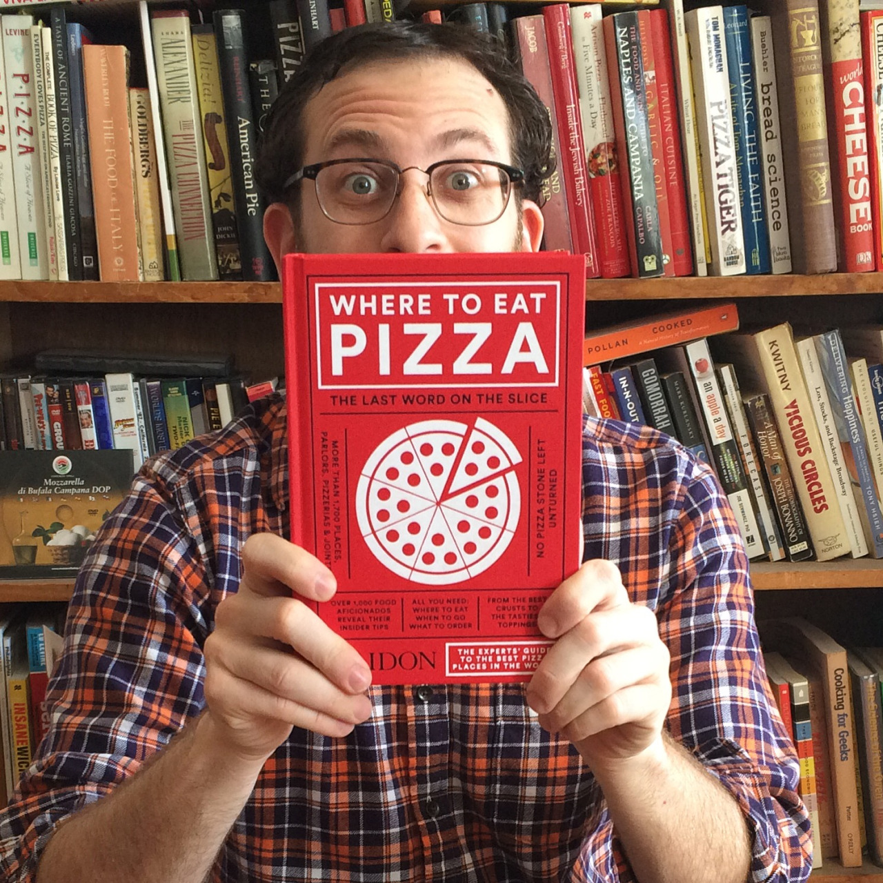 Contributor Scott Wiener with his copy of Where to Eat Pizza