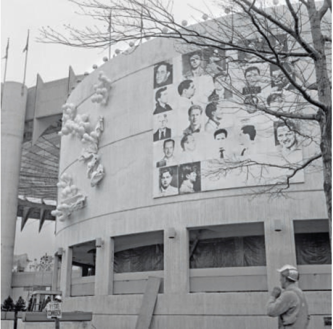 Andy Warhol, 13 Most Wanted Men, 1964, on the facade of the New York State Pavilion.