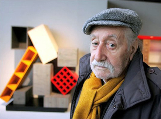 Ettore Sottsass (1917 - 2007) with some of his characteristic furniture