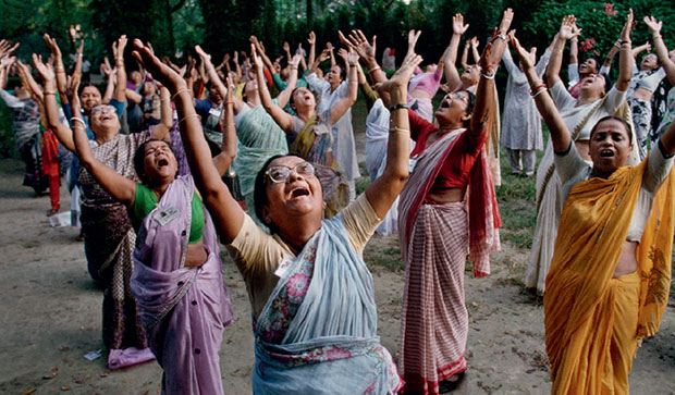 Women participate in a laughter club at Mumbai's Hanging Gardens - Steve McCurry from the book India