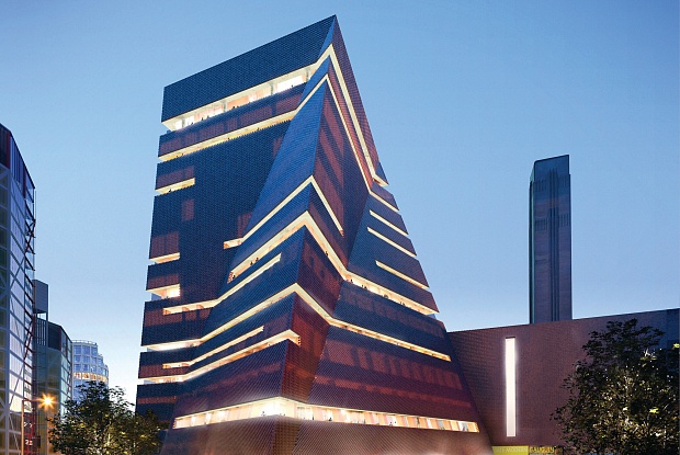 Tate Modern's new expansion, viewed from the south at dusk © Hayes Davidson and Herzog & de Meuron