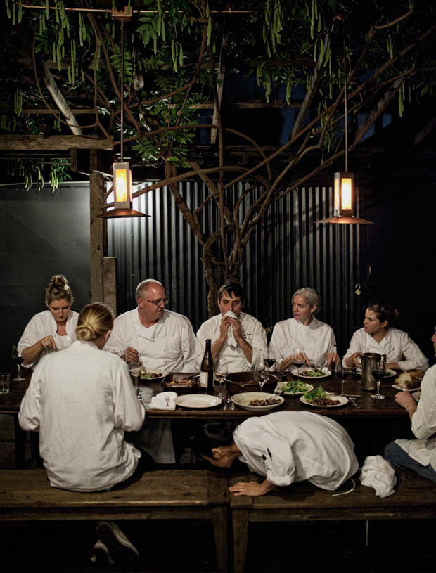 Taking a break from cooking, the staff of Chez Panisse eat outside - photograph by Per-Anders Jörgensen
