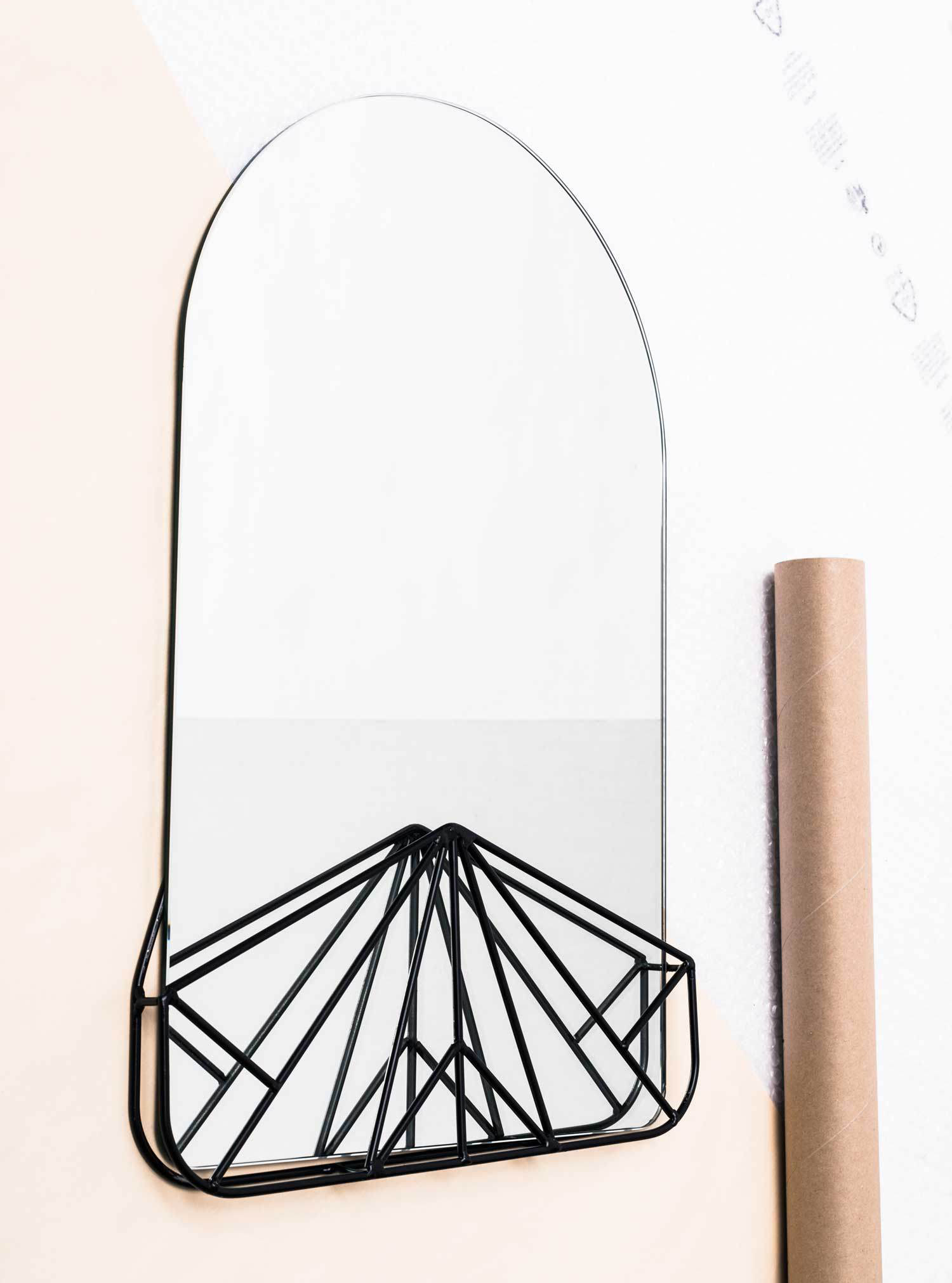 Vanity Affair, a rounded beauty mirror nested in a geometry of metal wire, by Gioria Zanellato