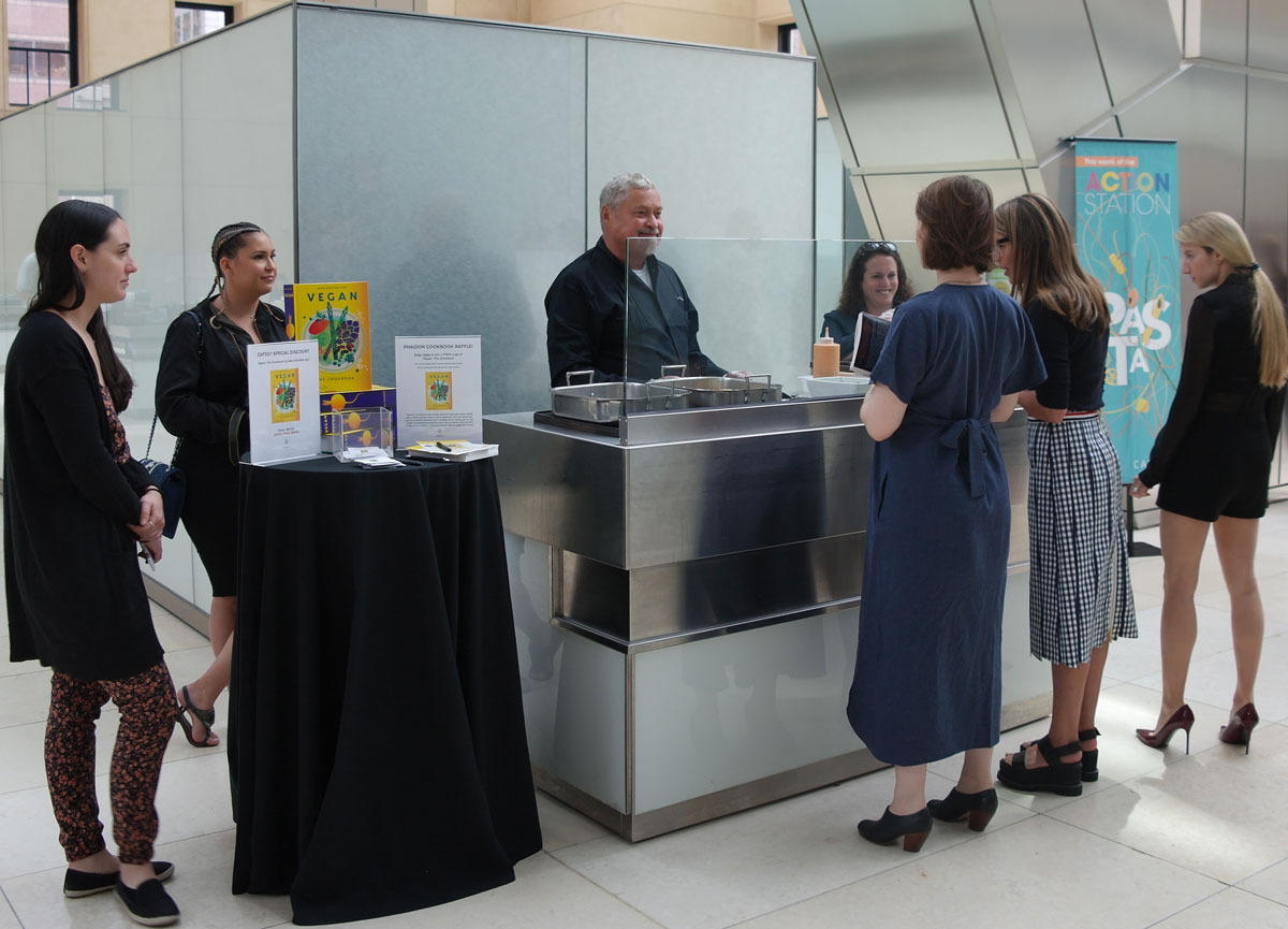 Jean-Christian Jury serving vegan food at Hearst Tower