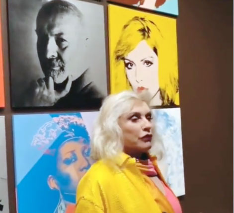 Debbie Harry with her portrait at a preview of the Whitney's new Warhol retrospective. Image courtesy of Blondie's Instagram
